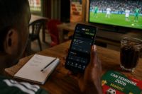 Comment les supporters africains utilisent les applications de paris pendant les tournois